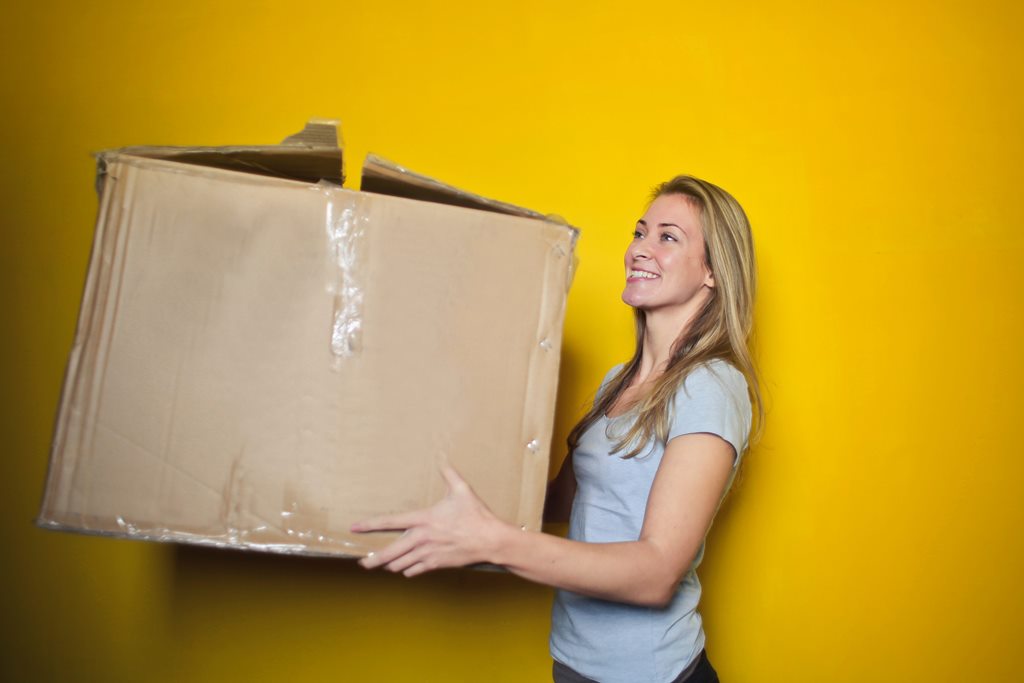 women packing a box